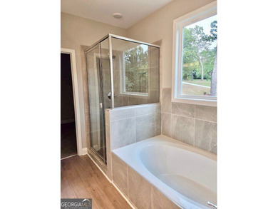 **NEW CONSTRUCTION** Move-in-Ready Ranch plan by TIH Homes with - photo 9