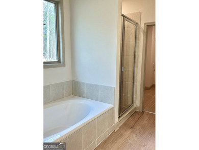 **NEW CONSTRUCTION** Move-in-Ready Ranch plan by TIH Homes with - photo 10