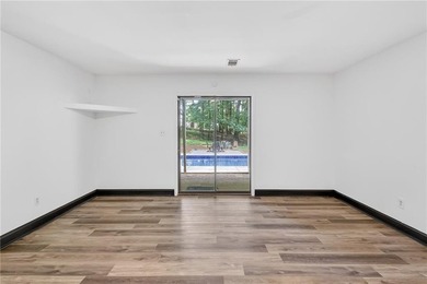 Tucked away on nearly an acre in the highly sought-after - photo 33
