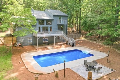 Tucked away on nearly an acre in the highly sought-after - photo 43