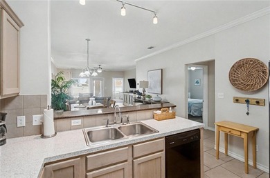 Welcome to Palm Bay Village Unit 101, a coastal retreat that - photo 14