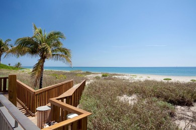 RARELY AVAILABLE BEACHFRONT VILLA OFFERING EFFORTLESS - photo 21