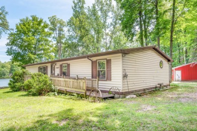 Lake Home For Sale in Weidman, Michigan