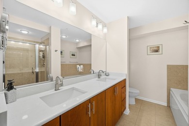 This move-in-ready luxury condo offers the perfect blend of - photo 11