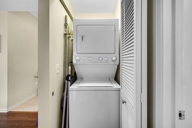 This move-in-ready luxury condo offers the perfect blend of - photo 16