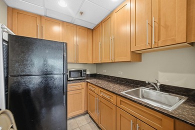 This move-in-ready luxury condo offers the perfect blend of - photo 25