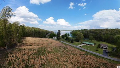 Perched above the sparkling waters of Lake Barkley, this - photo 5