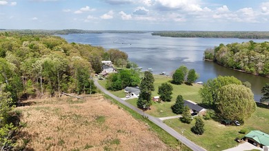 Perched above the sparkling waters of Lake Barkley, this - photo 8