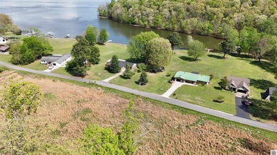 Perched above the sparkling waters of Lake Barkley, this - photo 9