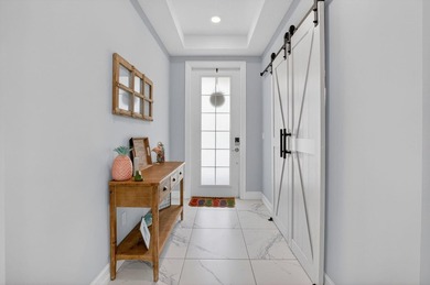 Discover waterfront living in Palm Meadows Estates. This - photo 6