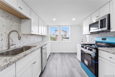 Discover beach living in this completely remodeled home just two - photo 3