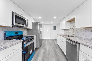 Discover beach living in this completely remodeled home just two - photo 4
