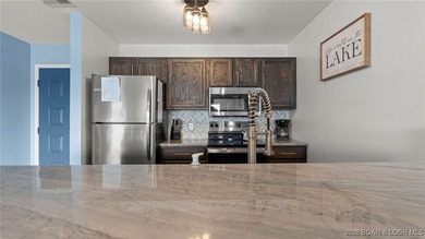 Motivated Seller!! Experience elevated lake living in this - photo 26