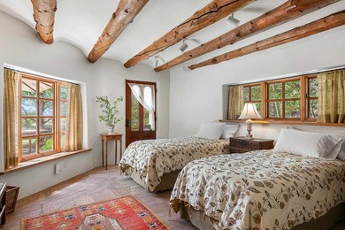 Comfortably tucked beneath the towering El Salto Mountain, sits - photo 32