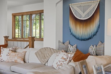 Experience elevated mountain living at 254 Pine Marten Way, a