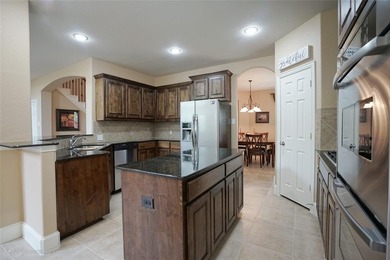 Welcome Home! This meticulously maintained home has 5 full