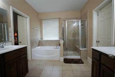 Welcome Home! This meticulously maintained home has 5 full