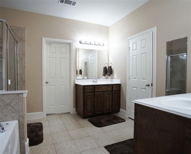 Welcome Home! This meticulously maintained home has 5 full