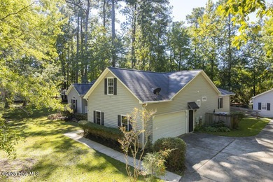 A splendid Stuart Hardy built house nestled in a gorgeous wooded