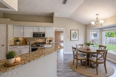 Welcome home to this beautifully updated 3-bedroom, 2-bath brick - photo 8