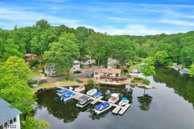 Tucked away in the community of Cranberry Lake. This charming - Lake Home Sale Pending in Byram Township, New Jersey