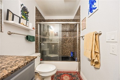 Welcome to this charming 2-bedroom, 1-bath upper-level condo - photo 14