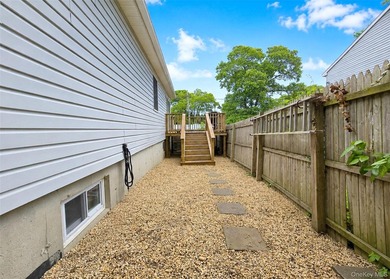 Spacious and open floor plan with cathedral ceilings welcome you - photo 18