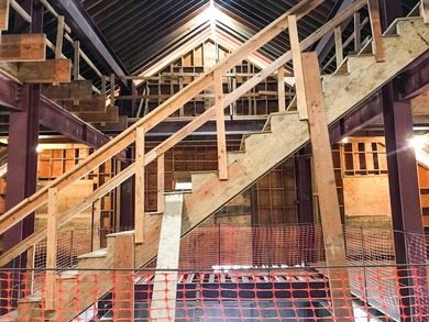 This listing includes a 4-story lodge and a 3-story garage with - photo 15