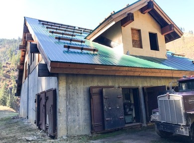This listing includes a 4-story lodge and a 3-story garage with - photo 19