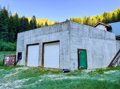 This listing includes a 4-story lodge and a 3-story garage with - photo 32