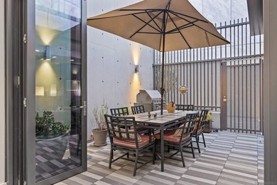 Combining the scale and privacy of a single-family home with the - photo 12