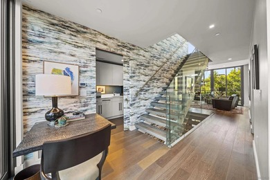 Combining the scale and privacy of a single-family home with the - photo 34