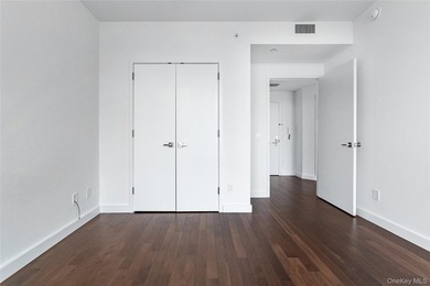 Welcome to Unit 9C at The Aston, a bright and modern high-floor - photo 19