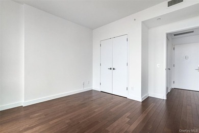 Welcome to Unit 9C at The Aston, a bright and modern high-floor - photo 20