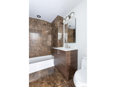 Welcome to Unit 9C at The Aston, a bright and modern high-floor - photo 23
