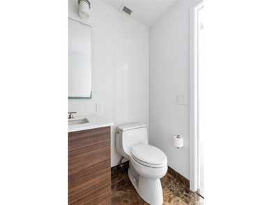 Welcome to Unit 9C at The Aston, a bright and modern high-floor - photo 24