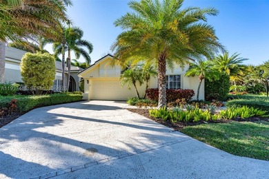 Nestled on a serene, private corner lot within the prestigious - photo 3
