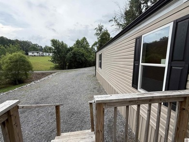13 Wells Lane, Gilbertsville, Ky. in Running Bear SD is where - photo 5