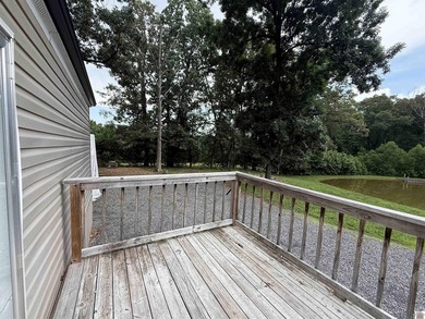 13 Wells Lane, Gilbertsville, Ky. in Running Bear SD is where - photo 7