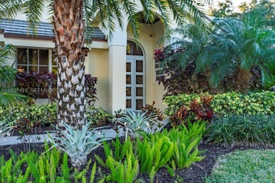Nestled on a serene, private corner lot within the prestigious - photo 8