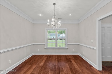 Welcome to this charming ranch-style home, thoughtfully designed