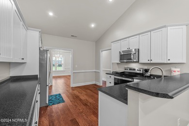 Welcome to this charming ranch-style home, thoughtfully designed