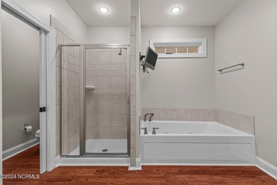 Welcome to this charming ranch-style home, thoughtfully designed