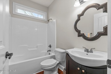 Welcome to this charming ranch-style home, thoughtfully designed