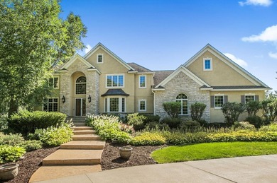 Tucked away on over two wooded acres in Sartell, this stunning - photo 1