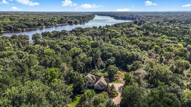 Tucked away on over two wooded acres in Sartell, this stunning - photo 2