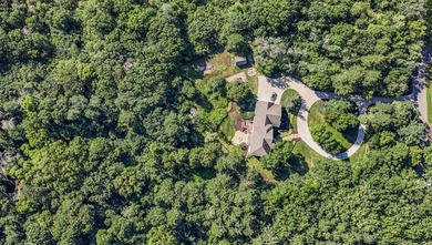 Tucked away on over two wooded acres in Sartell, this stunning - photo 3