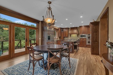 Tucked away on over two wooded acres in Sartell, this stunning - photo 9