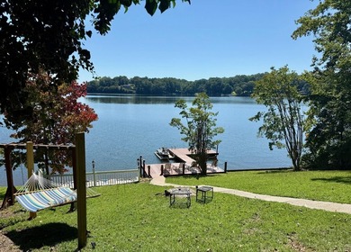 Experience the best of lakefront living with this rare - photo 2