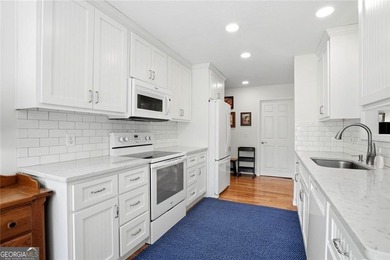 Step inside to discover extensive renovations throughout - photo 11